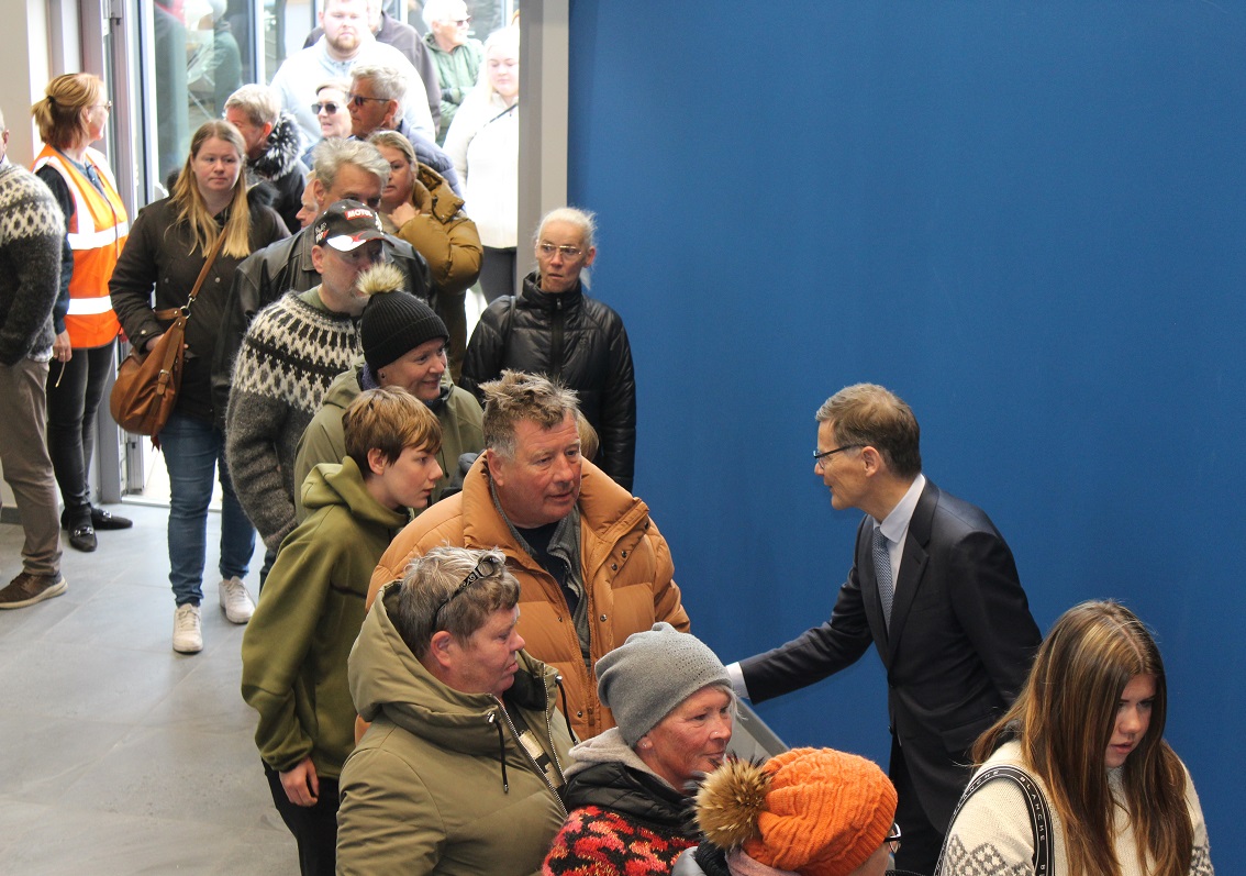 Thorsteinn Már Baldvinsson, CEO of Samherji, greets visitors during an open house event at the company's processing facility in Dalvík.